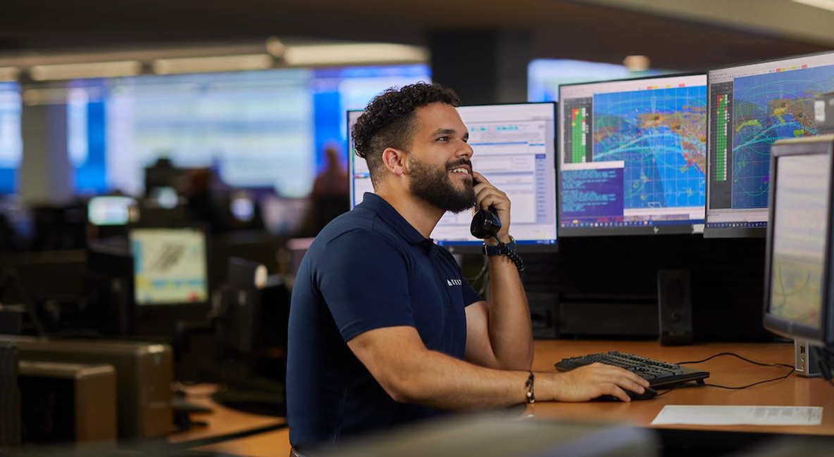 Aircraft dispatcher at work station